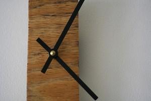 narrow wooden clock